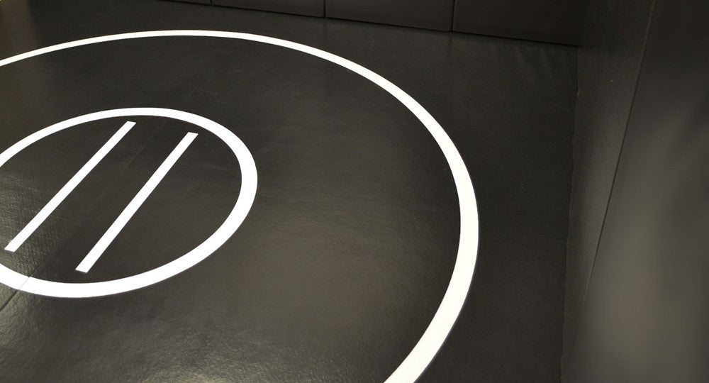 black and white wrestling mat